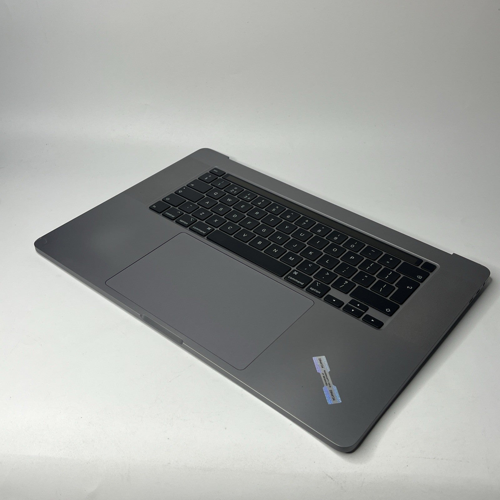 Genuine MacBook Pro16" A2141-2019 Palmrest keyboard Trackpad.  Bit Crack At Side