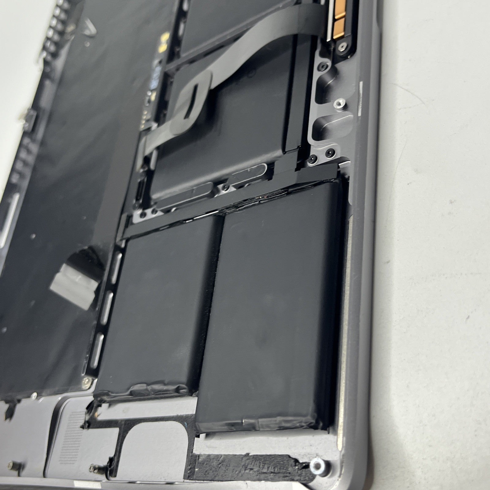 Genuine MacBook Pro16" A2141-2019 Palmrest keyboard Trackpad.  Bit Crack At Side