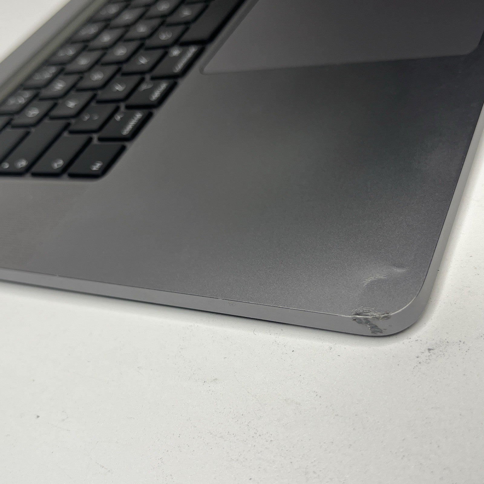 Genuine MacBook Pro16" A2141-2019 Palmrest keyboard Trackpad.  Bit Crack At Side