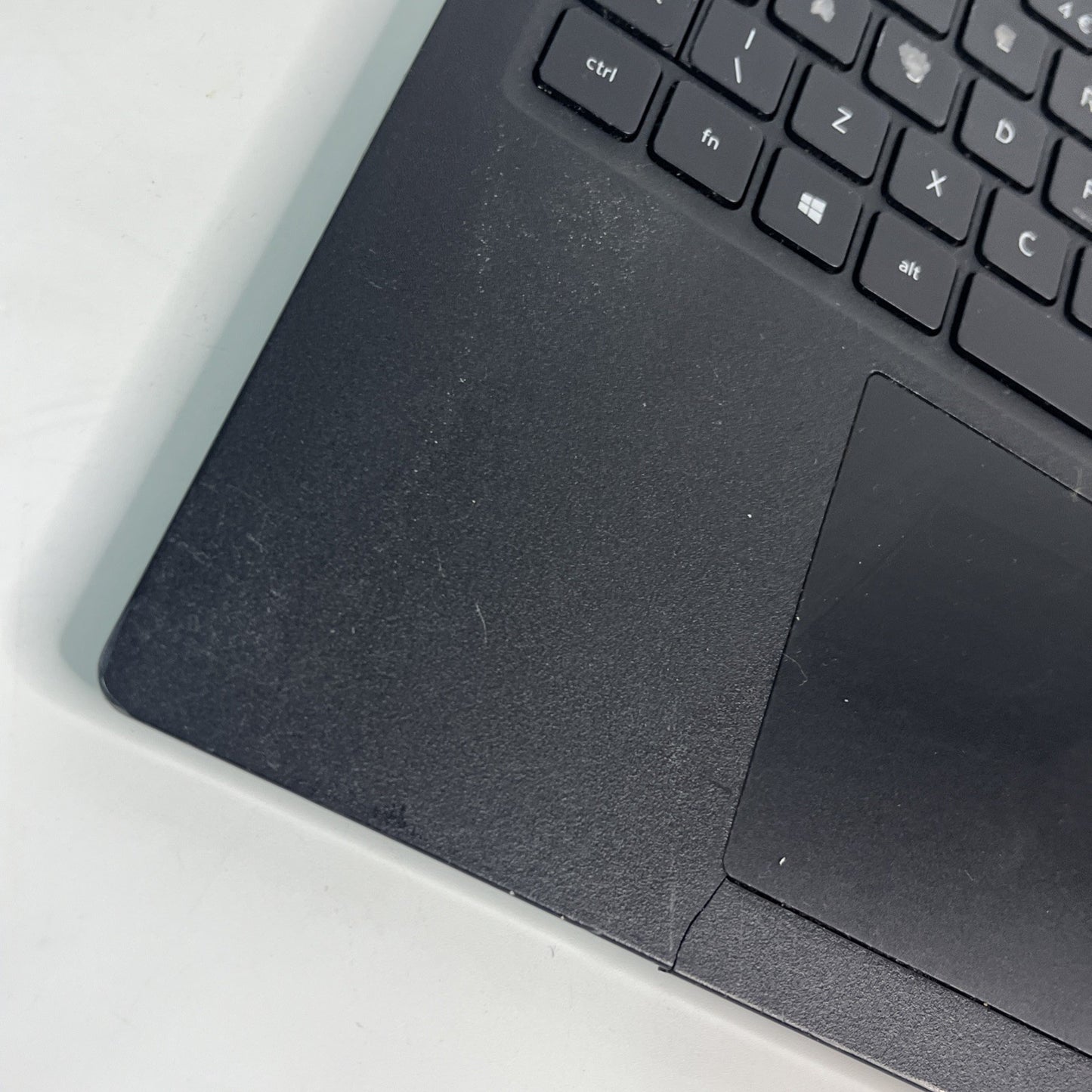 Genuine Black Dell Latitude 3520 Palmrest , Touchpad & Speakers. Bit Cracked