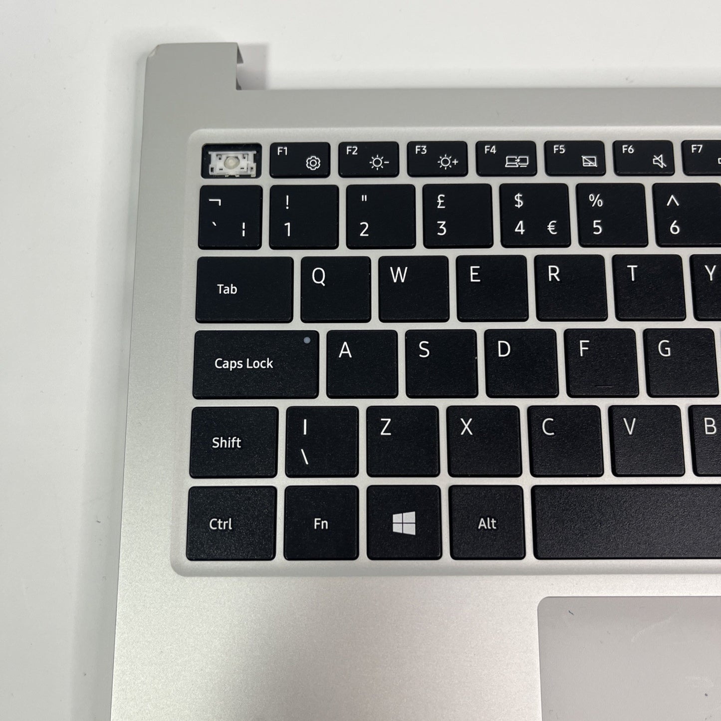 Genuine silver Samsung Galaxy NP750XDA  Palmrest & Keyboard&Speakers.missing Key