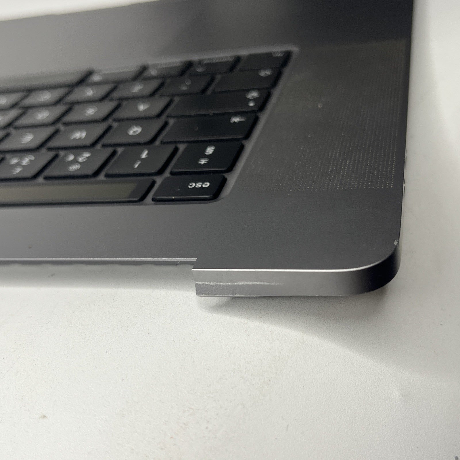 Genuine MacBook Pro16" A2141-2019 Palmrest keyboard Trackpad.  Bit Crack At Side