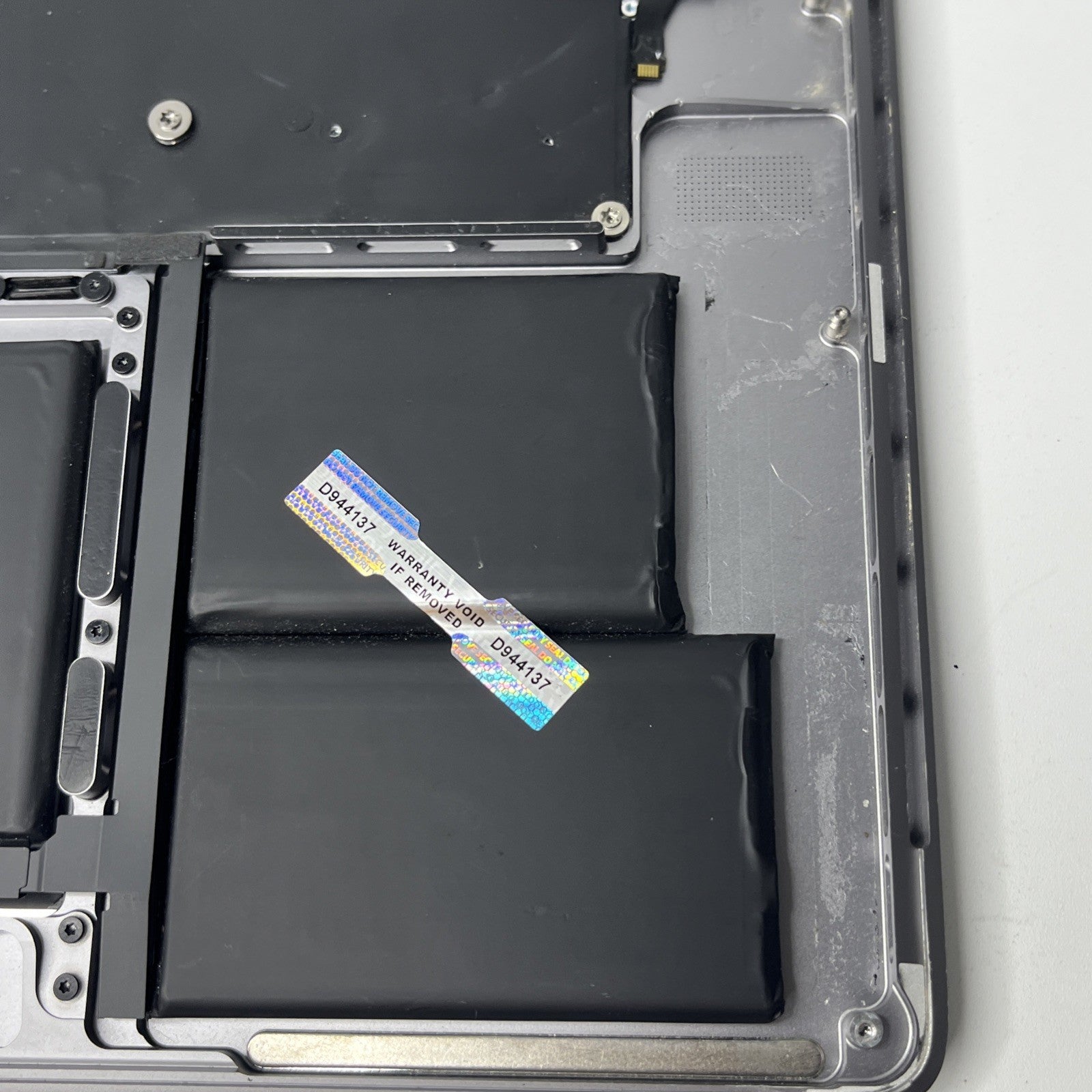 Genuine MacBook Pro16" A2141-2019 Palmrest keyboard Trackpad.  Bit Crack At Side